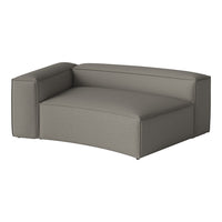 Gray upholstered sectional couch with a sleek, modern design and subtle texture. Ideal for contemporary seating.