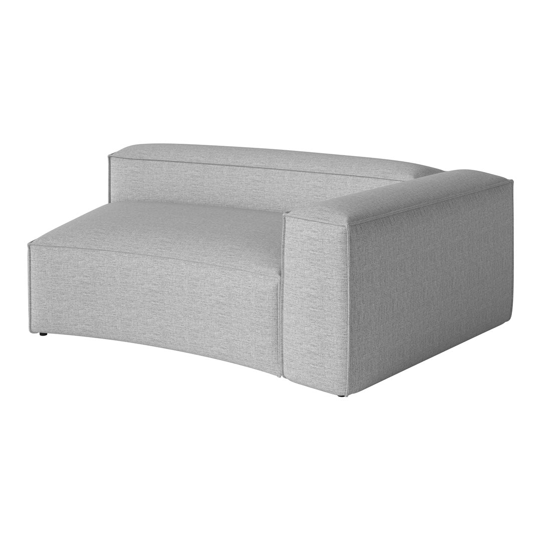 Gray curved sofa with a sleek, textured fabric, perfect for modern living spaces.