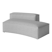 Curved gray sofa with a textured fabric, featuring a modern minimalist design and soft upholstery.