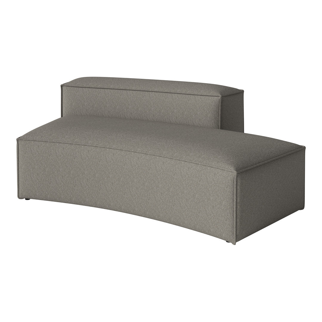 Curved gray upholstered sofa with a textured pattern, adding modern elegance to any space.