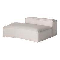 Soft cream chaise lounge with a smooth, textured fabric finish, ideal for modern interiors.