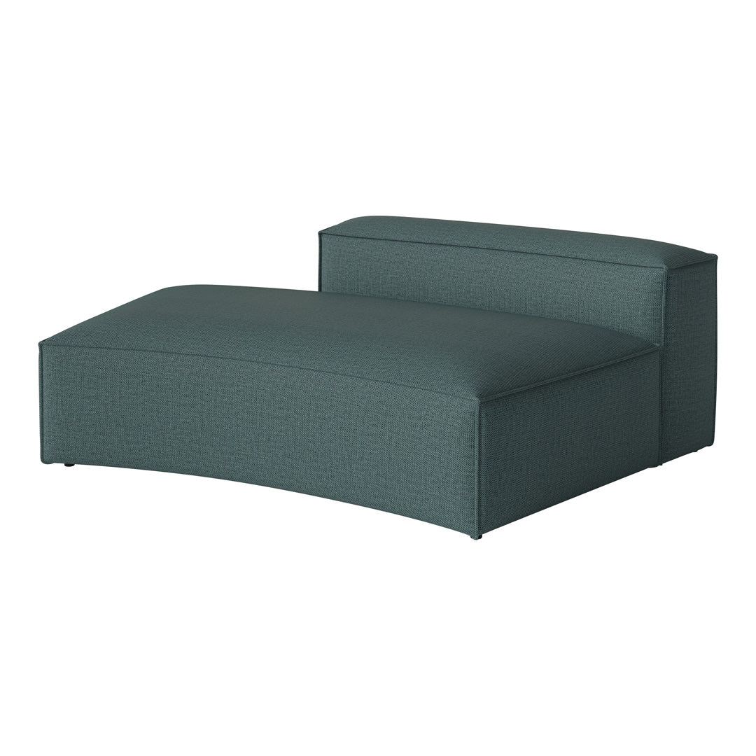 Teal upholstered lounge chair with a textured surface and sleek curves, perfect for modern interiors.