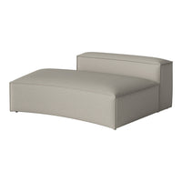 Light gray chaise lounge with a smooth, textured fabric and minimalist design. Perfect for modern interiors.