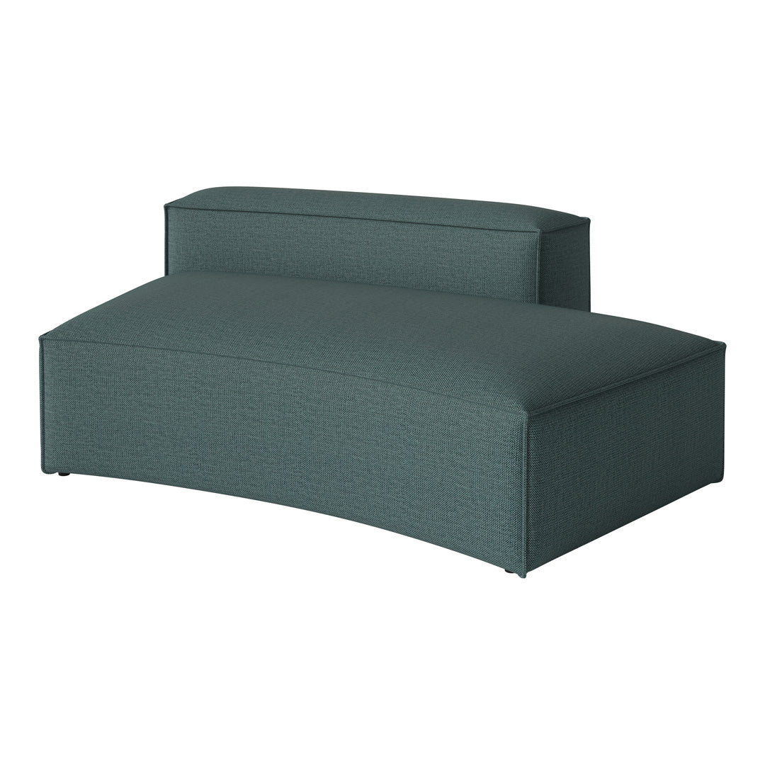 Teal curved sofa with a textured pattern, featuring a sleek and modern design perfect for any living space.