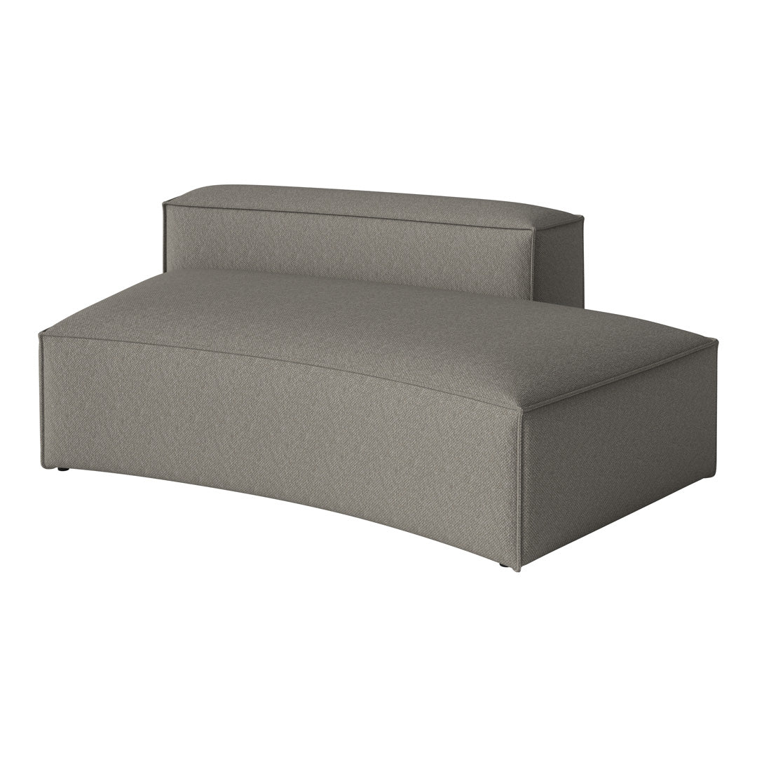 Gray upholstered lounge chair with a smooth, modern design and subtle textured pattern. Ideal for contemporary decor.