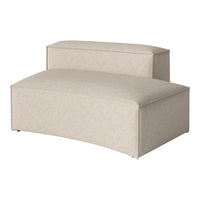 Soft beige upholstered chaise lounge with a subtle textured pattern and contemporary curved design.
