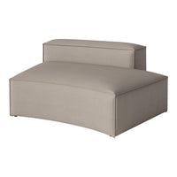 Curved lounge chair in soft beige with subtle textured pattern, perfect for modern living spaces.