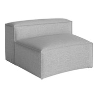 Light gray upholstered lounge chair with a subtle textured pattern, perfect for contemporary decor.