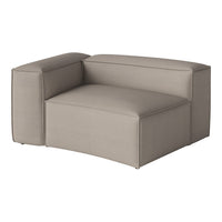 Beige modular sofa with a sleek, textured fabric and clean lines, perfect for modern living spaces.