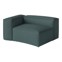 Teal upholstered lounge chair with a textured pattern and minimalist design. Perfect for modern interiors.