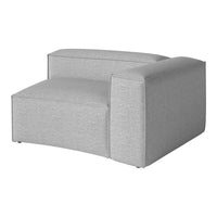 Modern gray upholstered corner chair with a textured fabric pattern for a cozy and stylish look.