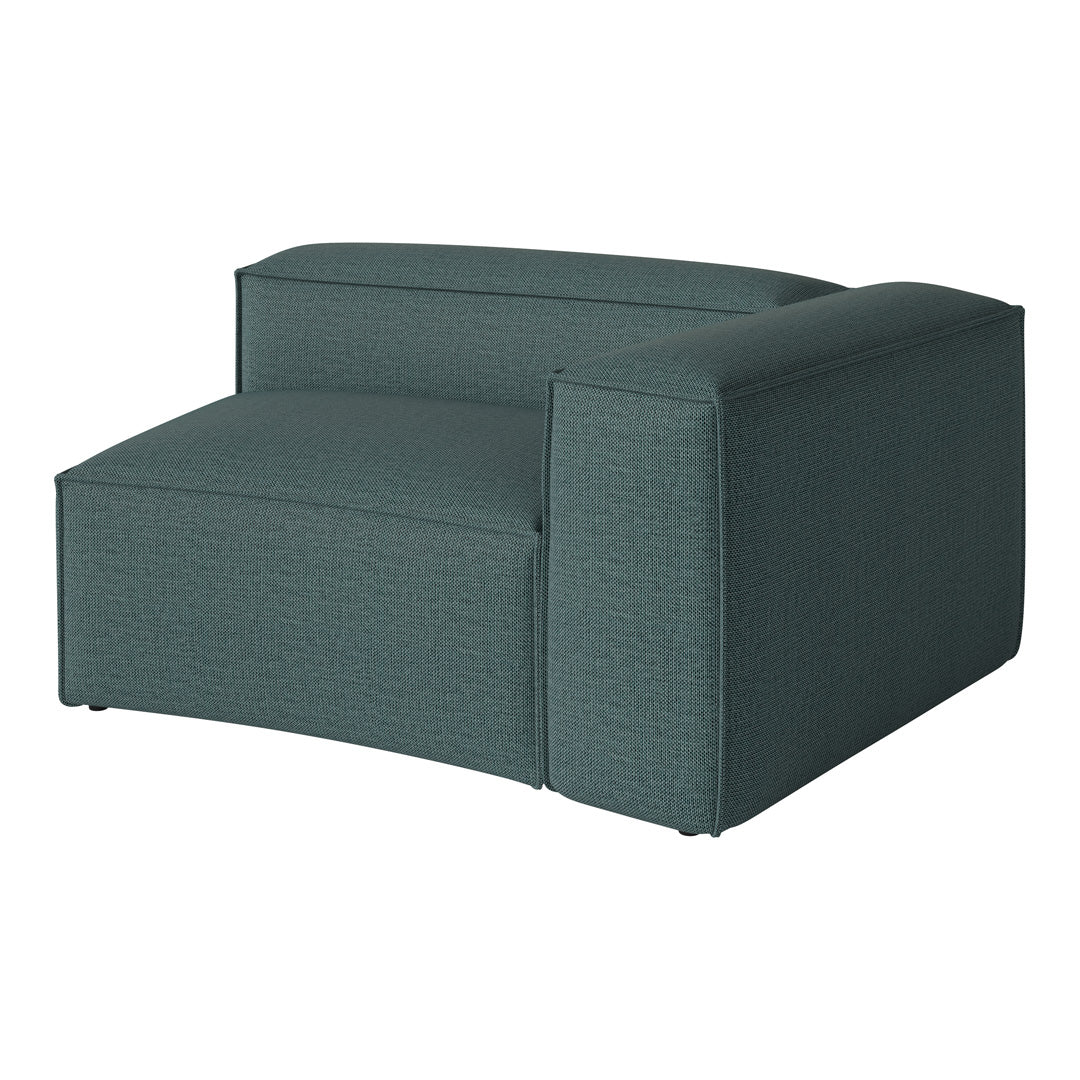 Teal modular sofa chair with textured fabric, featuring a clean, modern design perfect for contemporary spaces.