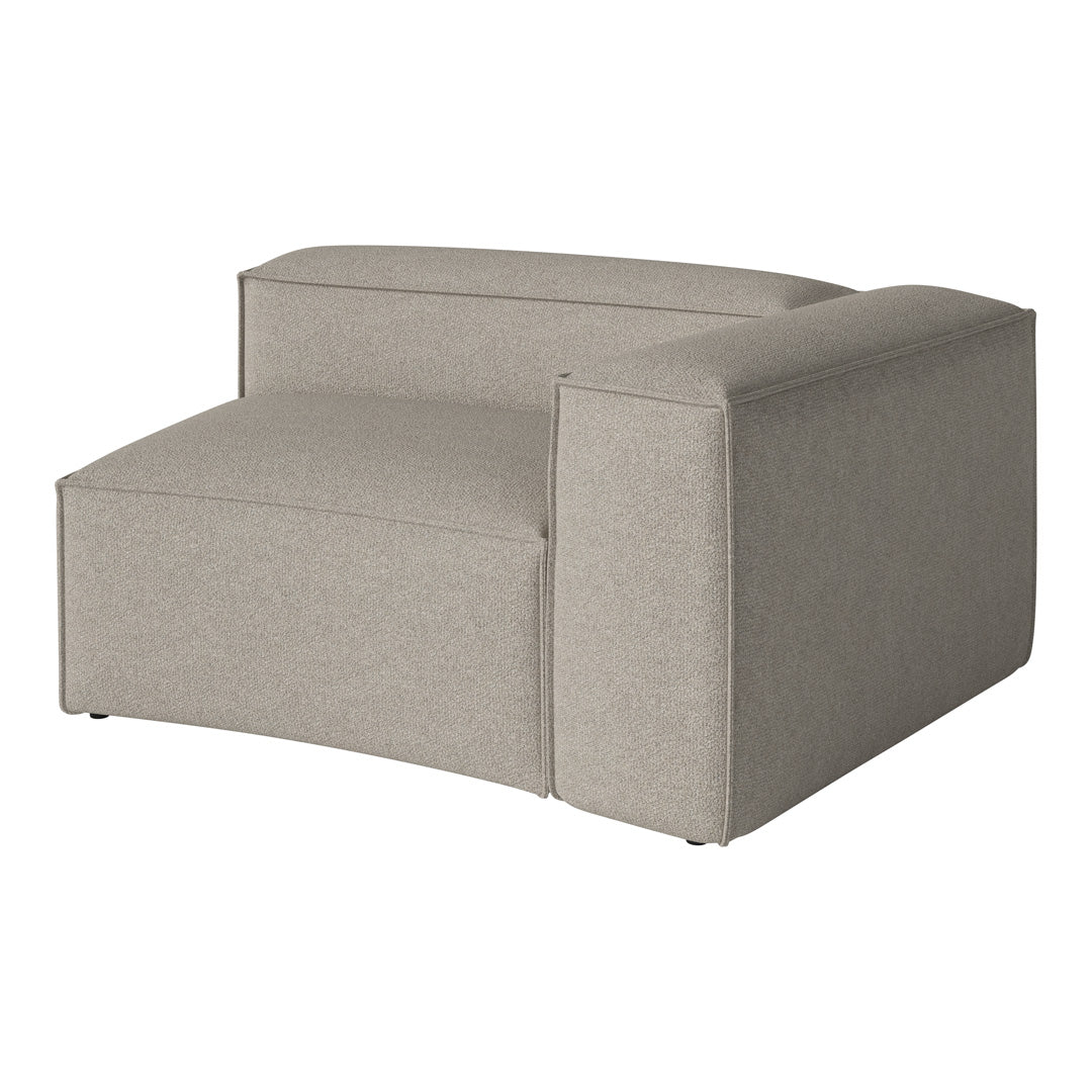 Gray upholstered modular sofa piece featuring a soft, textured fabric with a minimalistic design.