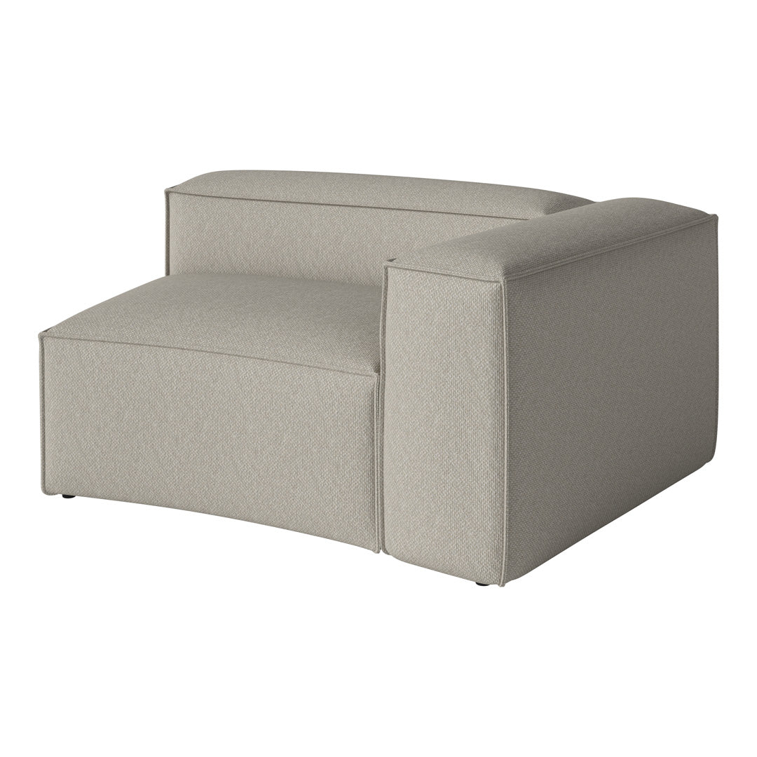 Light gray sectional armchair with a subtle textured pattern, ideal for modern and minimalist interiors.