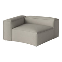 Light grey textured fabric corner chair with a modern design. Perfect for minimalist decor.