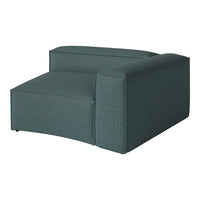 Teal upholstered corner chair with a textured fabric and modern design, perfect for stylish living spaces.
