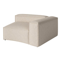 Beige upholstered corner chair with a soft, textured fabric and minimalist design. Ideal for modern interiors.