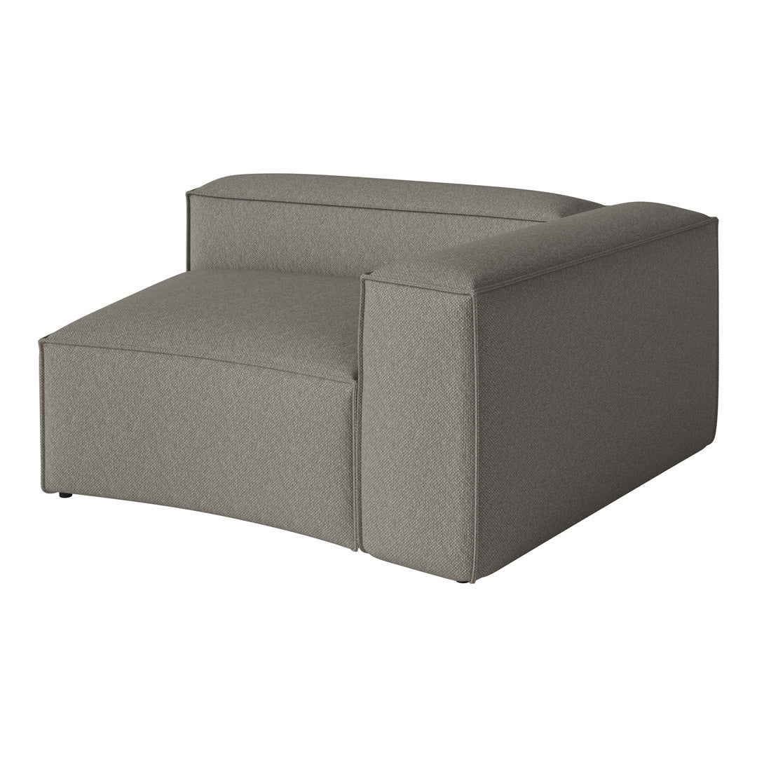 Gray armchair with a textured pattern, featuring a modern design and a sleek, minimalist silhouette.