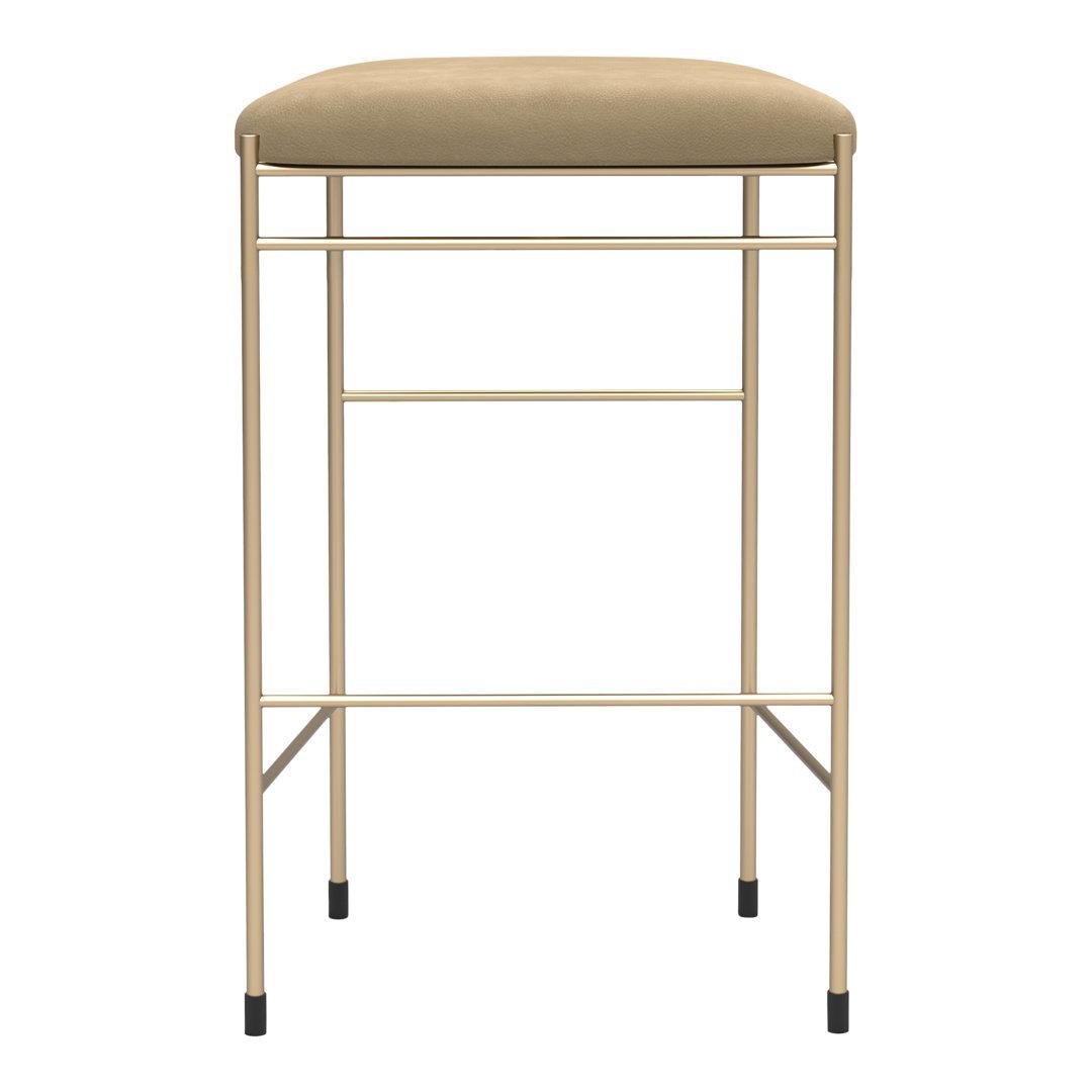"Tan upholstered bar stool with a sleek gold metal frame and black foot caps."