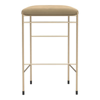 "Tan upholstered bar stool with a sleek gold metal frame and black foot caps."
