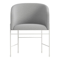 Gray upholstered chair with a smooth, contemporary design and a minimalist white metal frame.