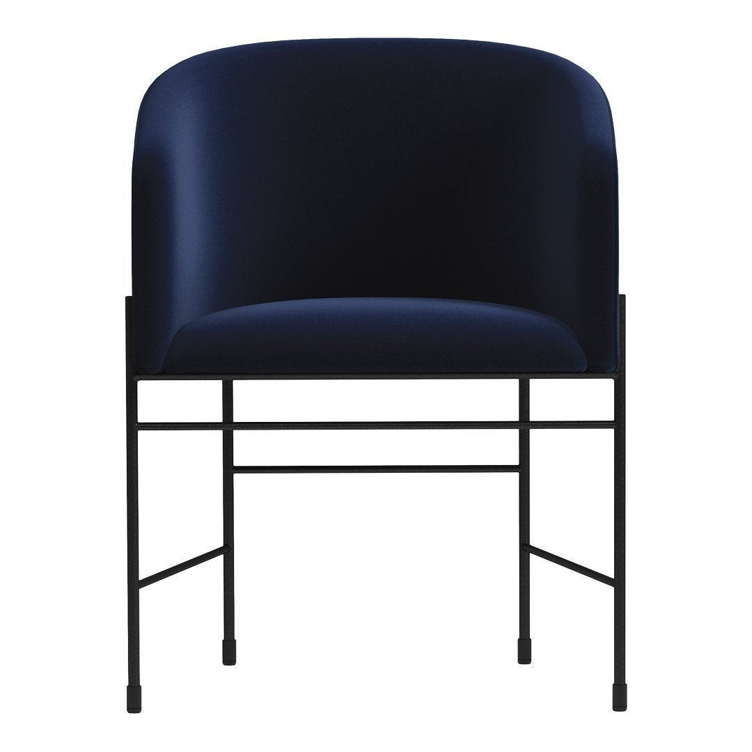 Navy blue upholstered chair with sleek black metal legs, featuring a minimalist design and curved backrest.