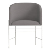 Gray upholstered chair with a smooth fabric texture and a minimalist white metal frame. Elegant and modern design.