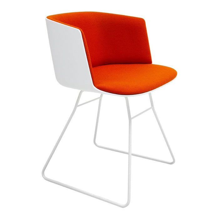 Modern chair with a bright orange seat and backrest, complemented by a sleek white base. Perfect for vibrant decor.