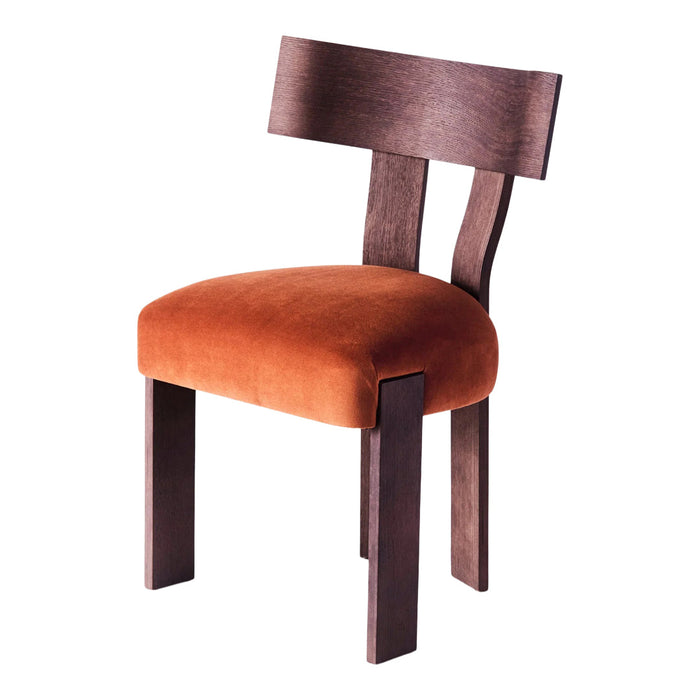 Wooden chair with a rich brown frame and soft orange velvet cushion, featuring a minimalist design.