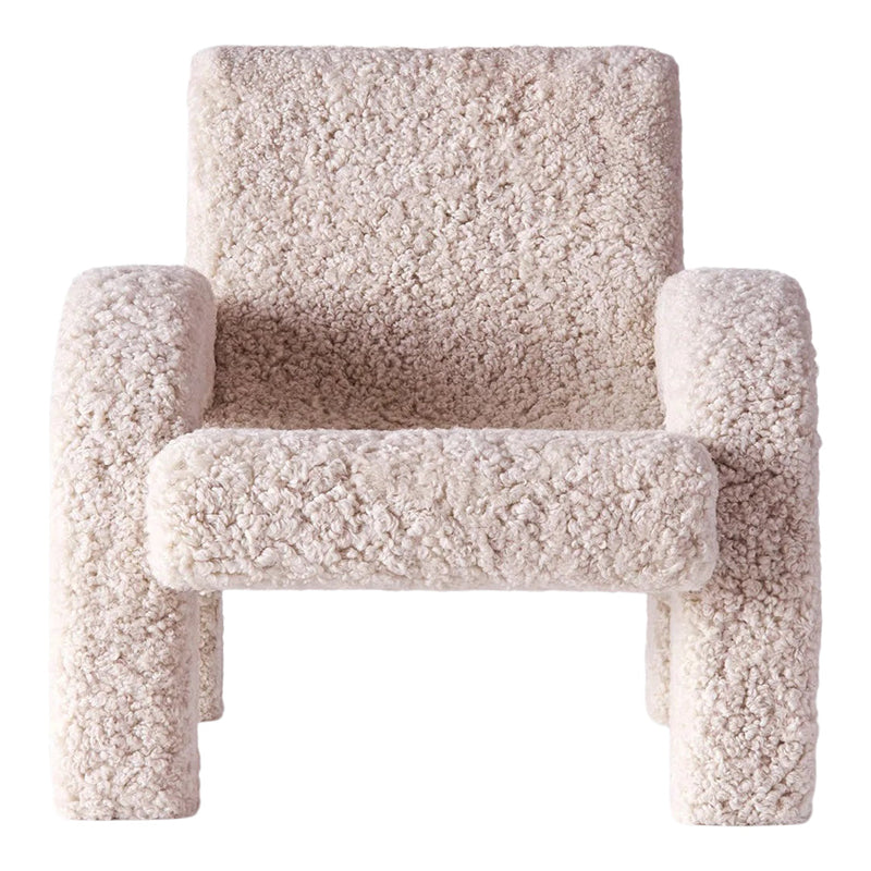 Cozy cream-colored chair with a soft, textured, fluffy pattern, perfect for modern decor.