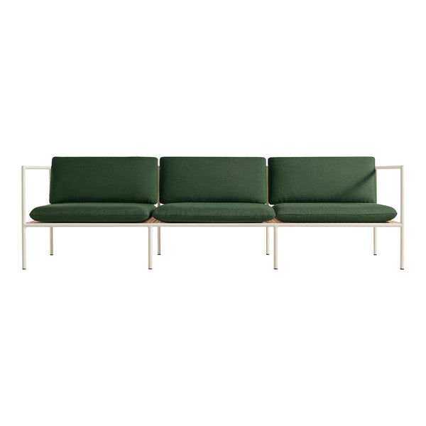 Modern green sofa with sleek lines and a minimalist white frame. Perfect for contemporary decor.