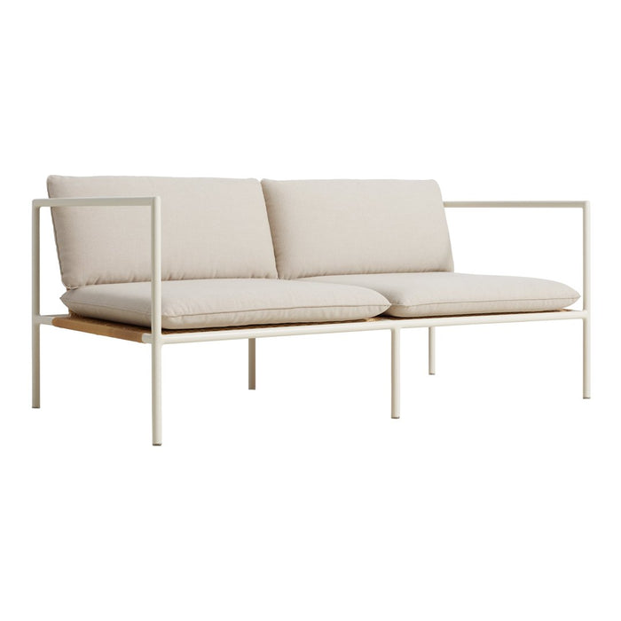 Beige sofa with cream cushions and a minimalist white metal frame, perfect for modern decor.