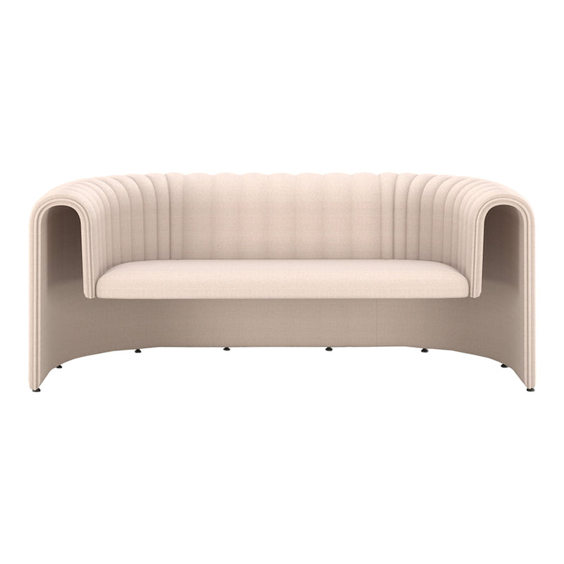 Beige curved sofa with ribbed detailing and smooth, modern lines, perfect for contemporary spaces.