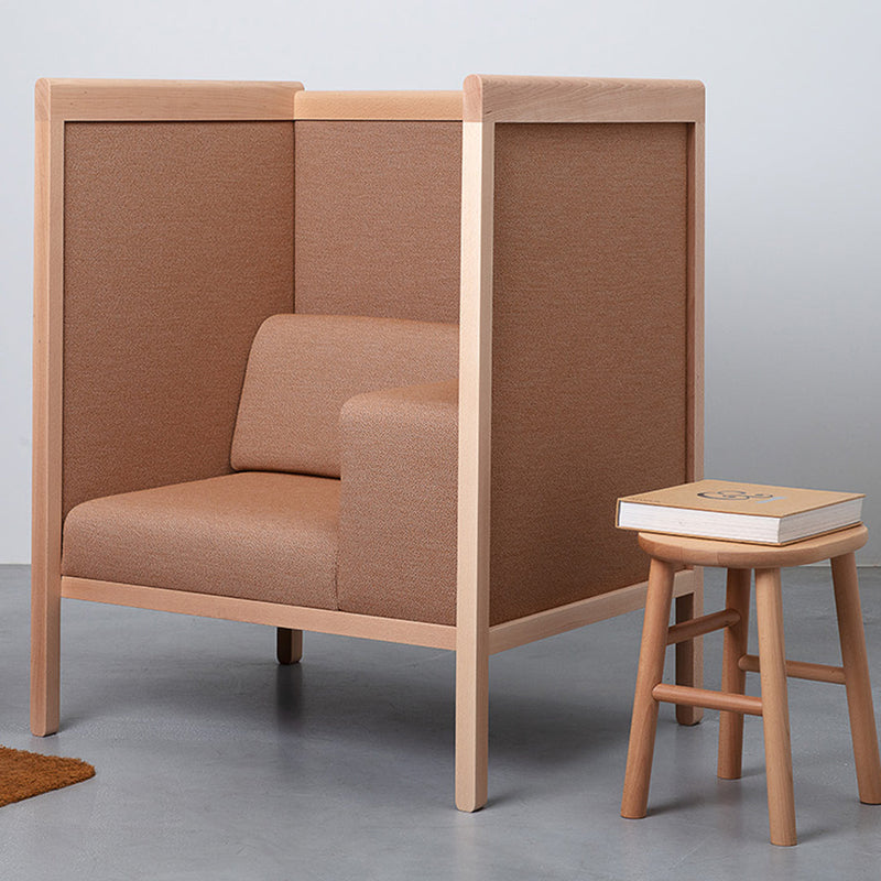 Brown fabric armchair with light wood framing, featuring a minimalist design and subtle texture. Perfect for modern spaces.