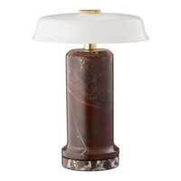 Marble lamp with deep red hues, white glass shade, and elegant brass accent. Unique marble patterns create visual interest.