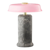 Stylish lamp featuring a gray marble base and a soft pink glass shade, creating a modern aesthetic.