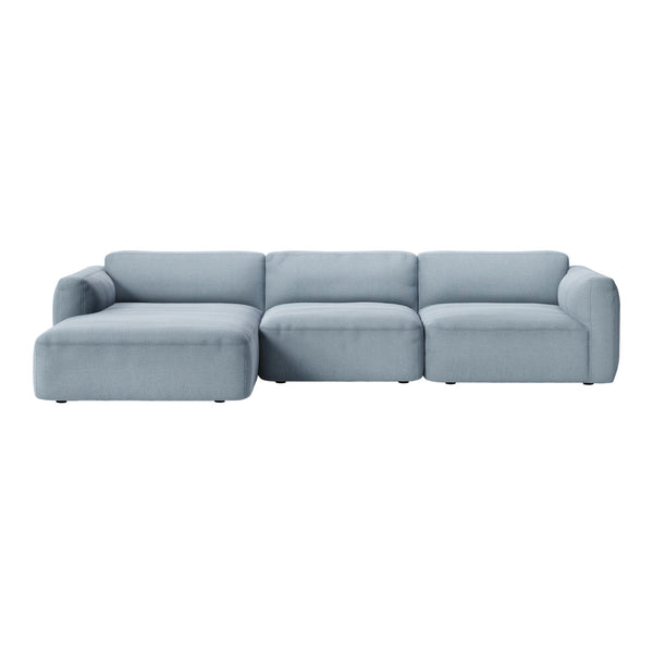 Light blue modern sectional sofa with sleek lines and a minimalist design, perfect for contemporary interiors.
