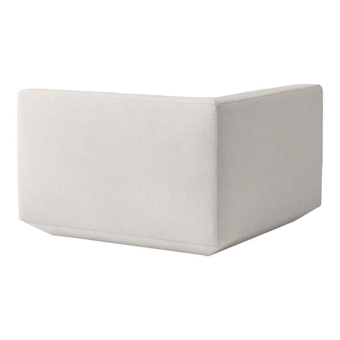 Soft beige corner couch with a smooth, minimalist design and no visible patterns, perfect for modern decor.