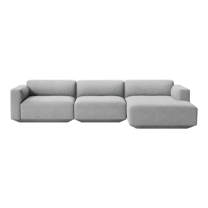 Gray sectional sofa with a modern, minimalist design and clean lines. Perfect for contemporary living spaces.