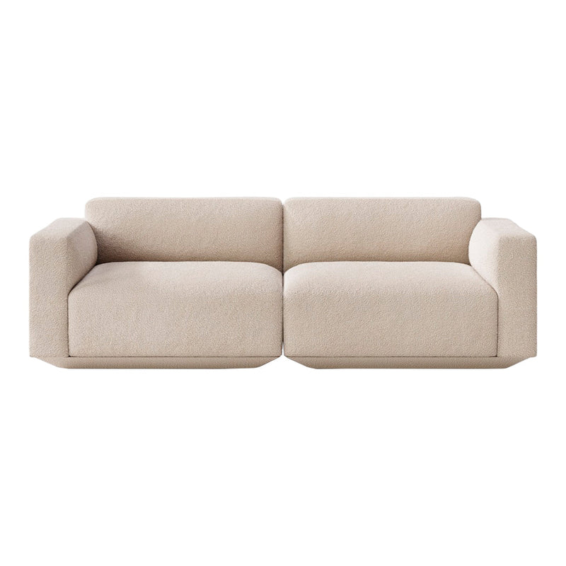 Beige modular sofa with clean lines and a soft texture, perfect for modern living spaces.