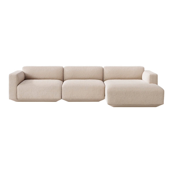 Beige modern sectional sofa with a minimalist design and soft, uniform fabric texture. Perfect for contemporary living spaces.