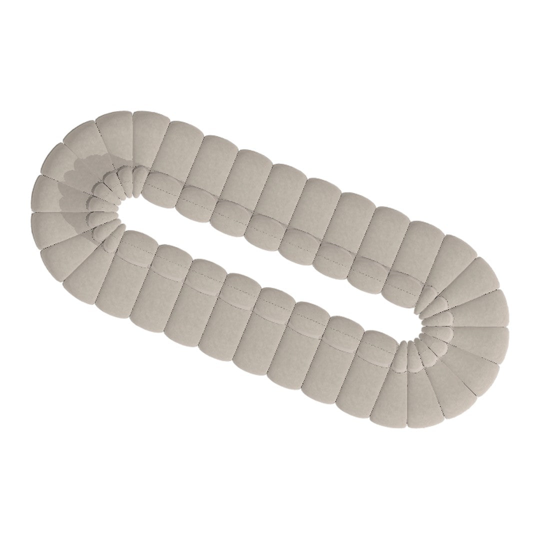 Light beige soft cushion in a rounded, segmented design with subtle stitching detail. Perfect for home decor.