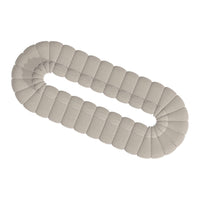 Light beige soft cushion in a rounded, segmented design with subtle stitching detail. Perfect for home decor.