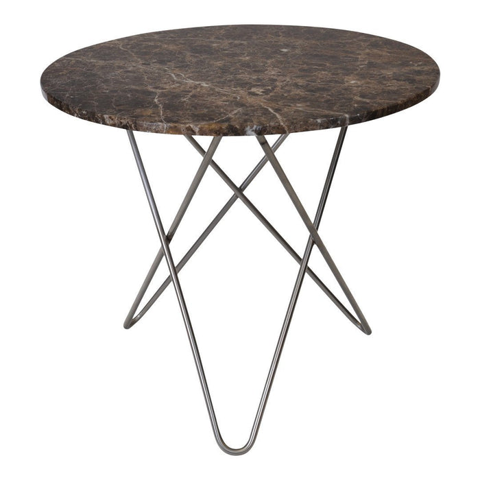 Round marble table with dark brown surface and white veining, supported by a sleek, geometric metal base.