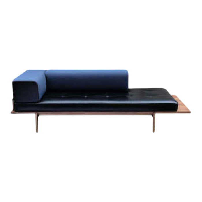 Modern two-tone sofa in deep blue and sleek black, featuring a minimalist design with clean lines and a wooden base.