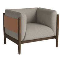 Gray upholstered armchair with a sleek brown wooden frame and a contrasting tan leather accent. Modern and stylish design.