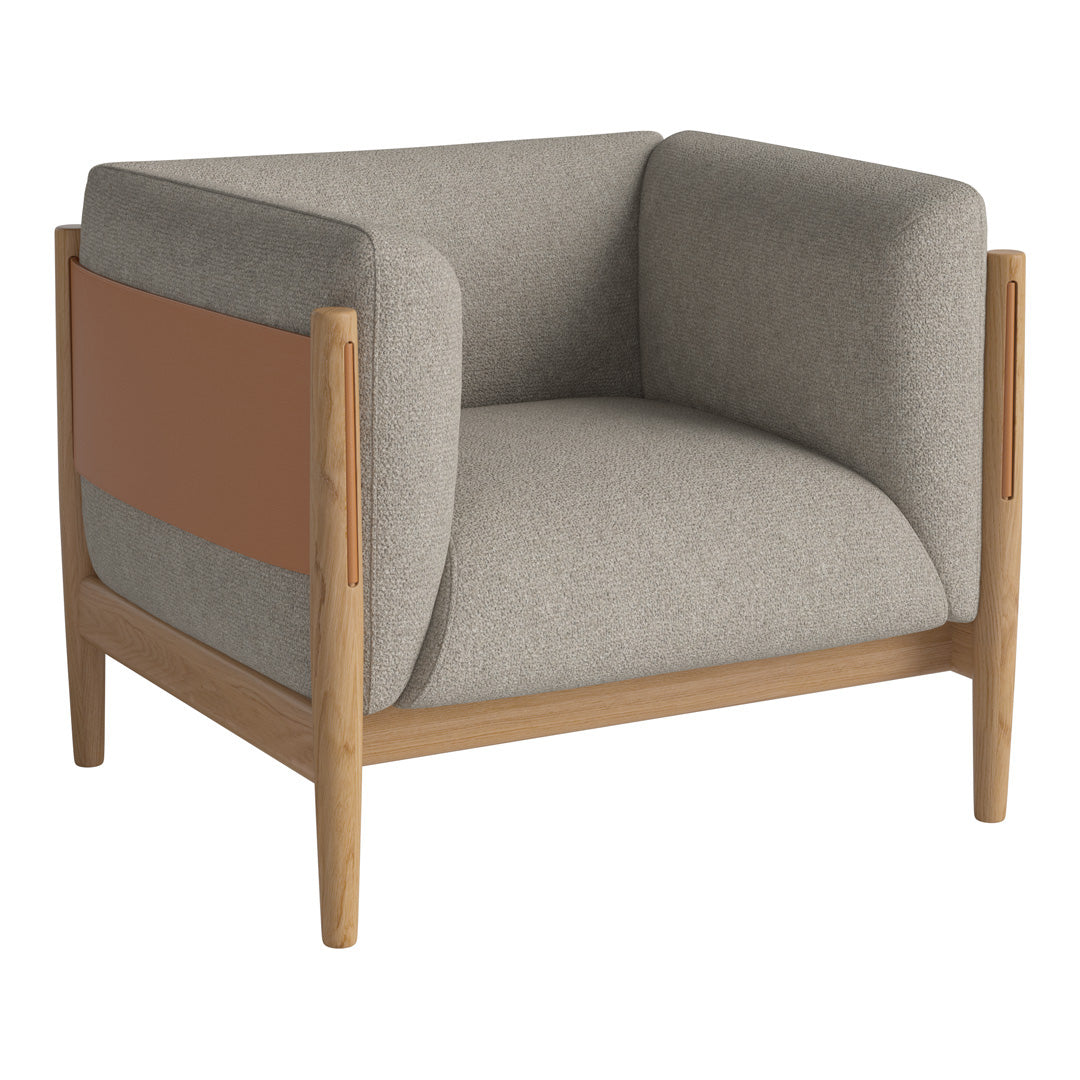 Grey upholstered armchair with tan accent and natural wood frame. Modern, minimalist design with a soft texture.