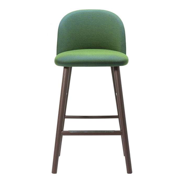 Green upholstered bar stool with a smooth, rounded seat and brown wooden legs. Modern design with vibrant colors.