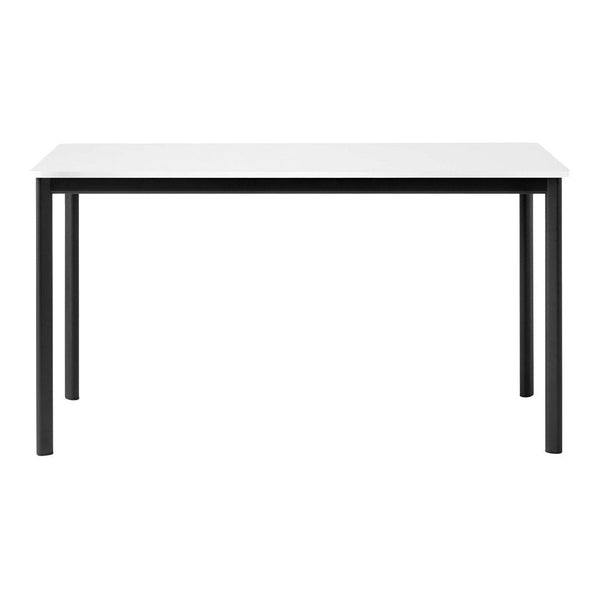 White tabletop with sleek black legs, featuring a minimalist design and smooth surface, perfect for modern decor.
