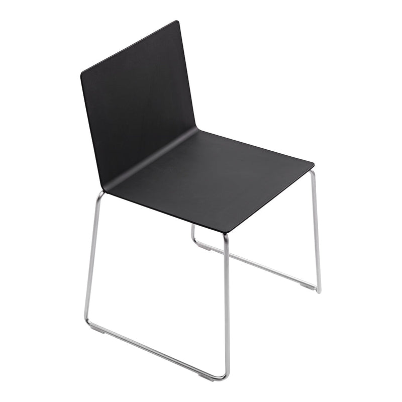 Black minimalist chair with sleek chrome legs, perfect for modern decor.